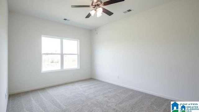 carpeted empty room with ceiling fan