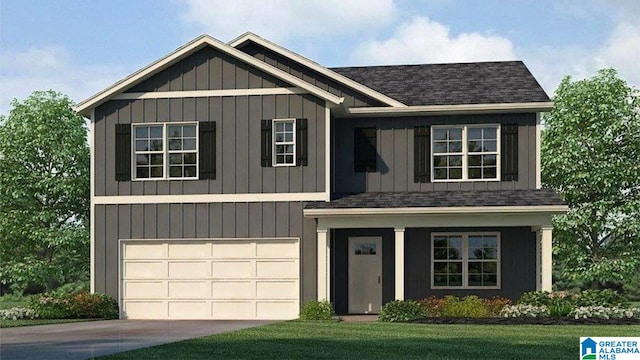 view of front facade with a garage and a front yard