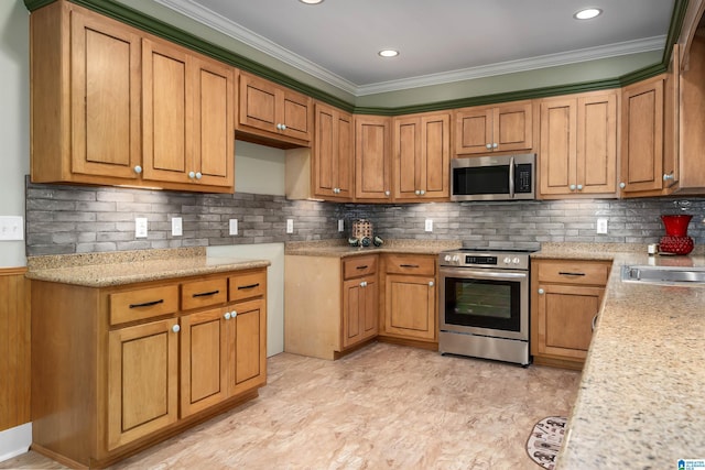 kitchen featuring sink, ornamental molding, stainless steel appliances, and tasteful backsplash