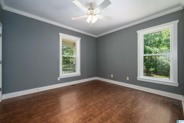 unfurnished room with ceiling fan, dark hardwood / wood-style flooring, and ornamental molding