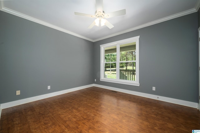 unfurnished room featuring ceiling fan, dark hardwood / wood-style floors, and crown molding