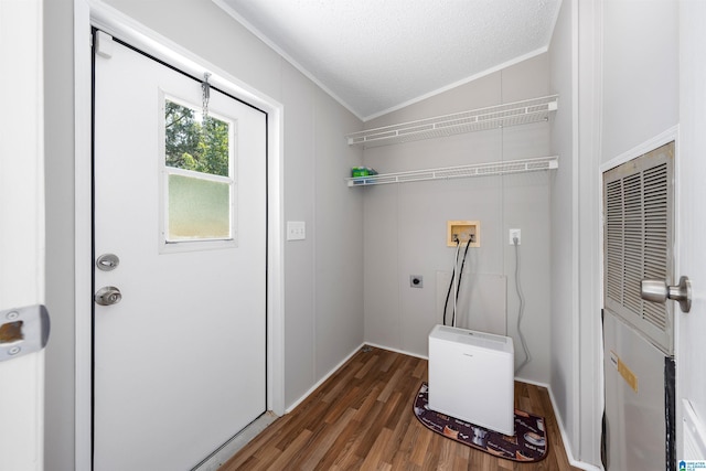 washroom with a textured ceiling, electric dryer hookup, washer hookup, dark hardwood / wood-style floors, and crown molding