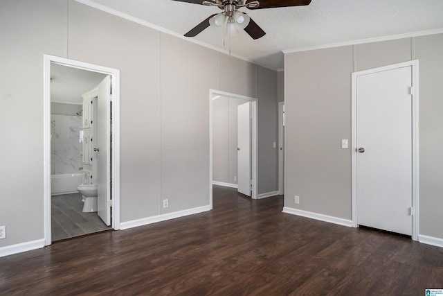 unfurnished bedroom featuring ceiling fan, dark wood-type flooring, connected bathroom, and ornamental molding