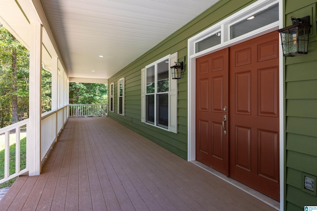 wooden terrace with covered porch