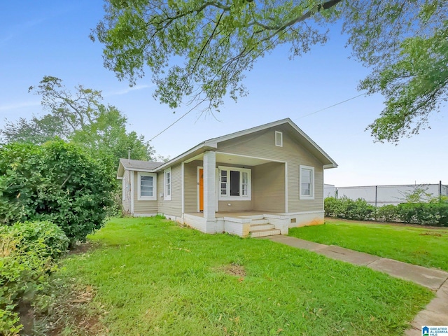 view of front of home featuring a front lawn