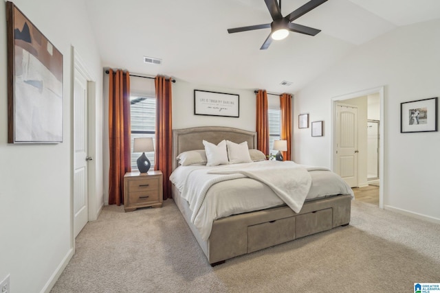 carpeted bedroom featuring ceiling fan and lofted ceiling