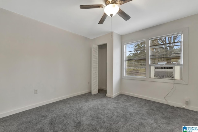 unfurnished bedroom featuring ceiling fan, a closet, cooling unit, and carpet flooring