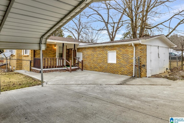 exterior space featuring a carport