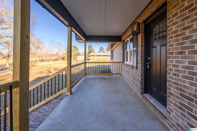 view of patio featuring a porch