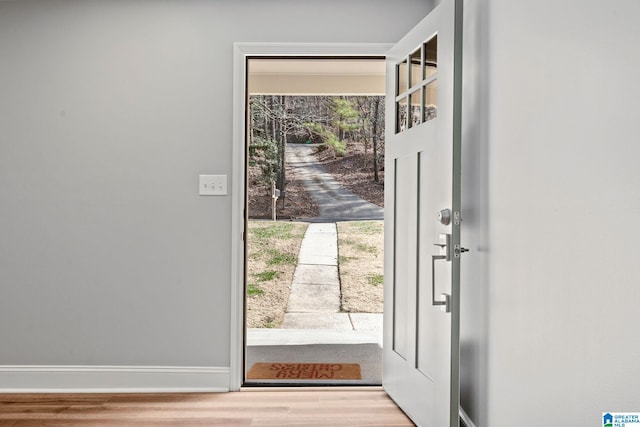 doorway with light hardwood / wood-style floors