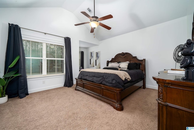 carpeted bedroom featuring lofted ceiling and ceiling fan