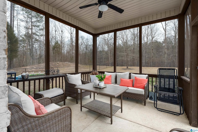 sunroom / solarium with ceiling fan