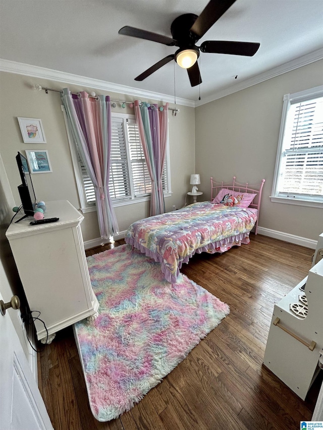 bedroom with ceiling fan, ornamental molding, and dark hardwood / wood-style flooring