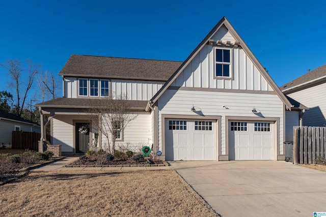 view of front of home with a front yard and a garage