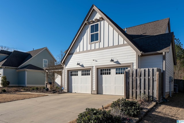 view of side of property with a garage