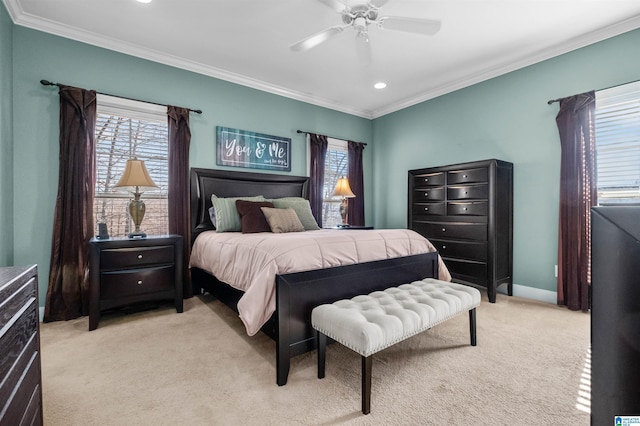 carpeted bedroom with multiple windows, crown molding, and ceiling fan