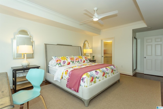 bedroom featuring ceiling fan and ornamental molding