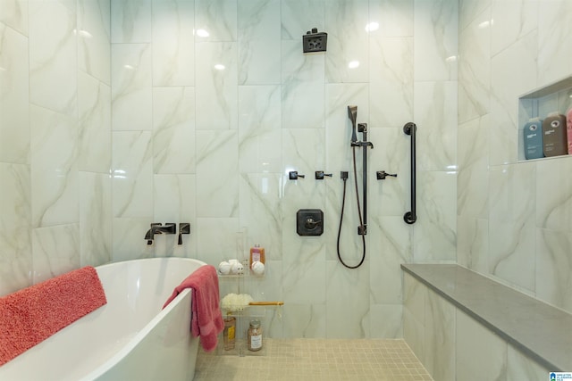 bathroom featuring separate shower and tub