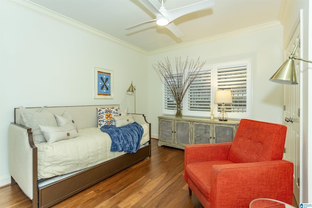 bedroom featuring ceiling fan, crown molding, and dark hardwood / wood-style flooring