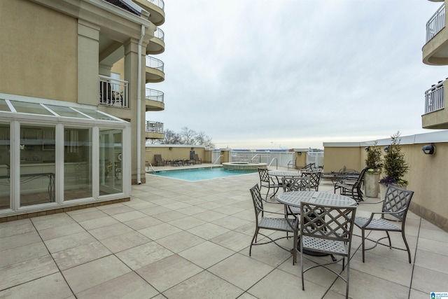 view of pool with a patio