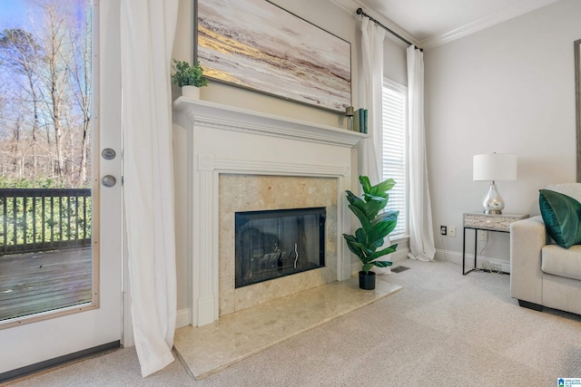 living room featuring light carpet, a high end fireplace, and ornamental molding