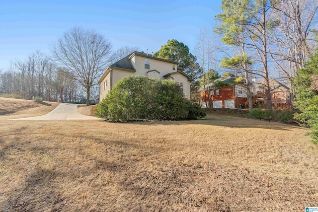 view of home's exterior featuring a yard