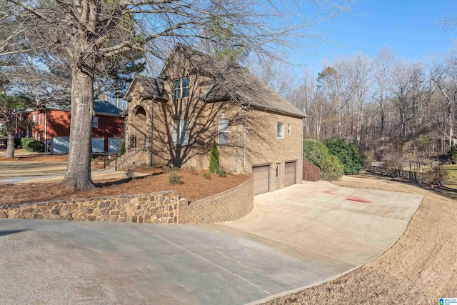 view of home's exterior with a garage