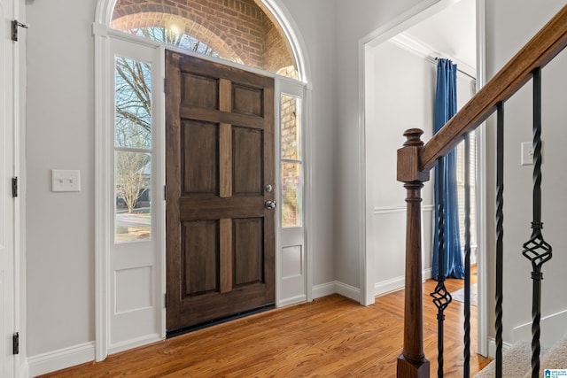 entryway with light hardwood / wood-style flooring