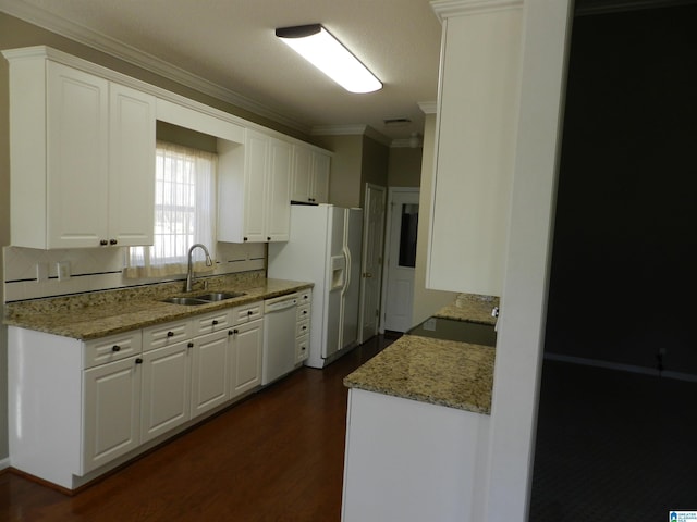 kitchen featuring sink, white appliances, white cabinetry, ornamental molding, and light stone counters