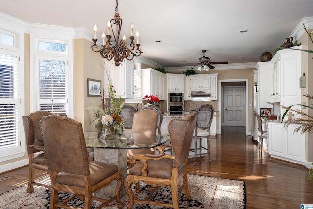 dining room featuring ceiling fan with notable chandelier, dark hardwood / wood-style flooring, and crown molding