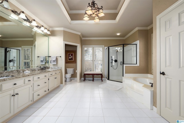 full bathroom featuring crown molding, toilet, tile patterned floors, and a tray ceiling