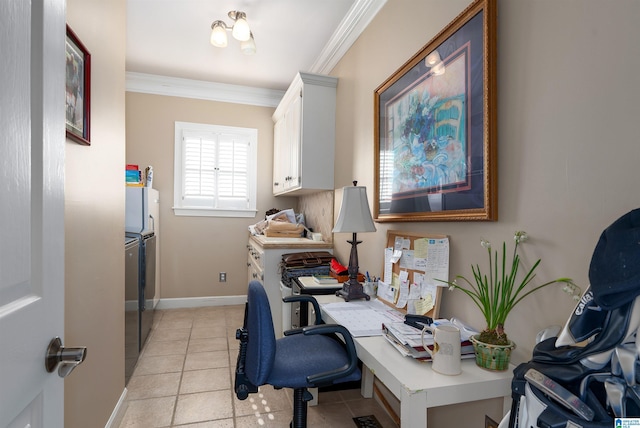 office space featuring washing machine and clothes dryer, crown molding, and light tile patterned floors