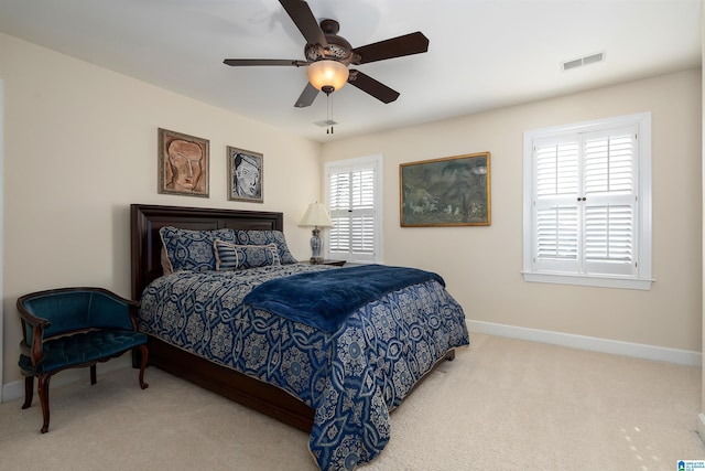 bedroom featuring ceiling fan and carpet floors