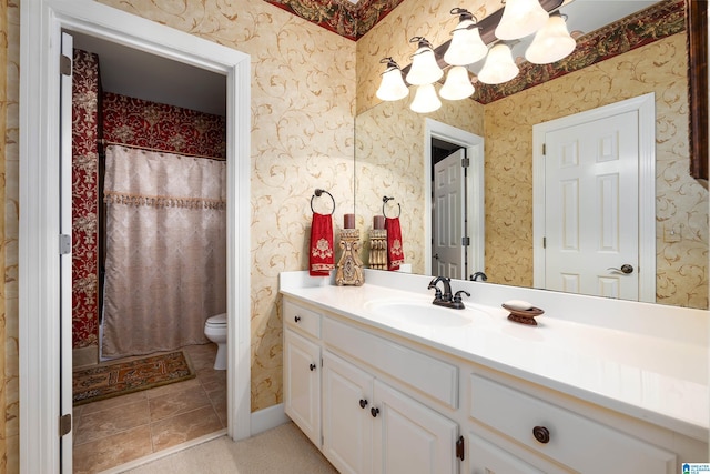 bathroom with tile patterned floors, curtained shower, toilet, vanity, and a chandelier