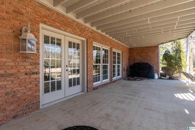 view of patio with french doors and grilling area