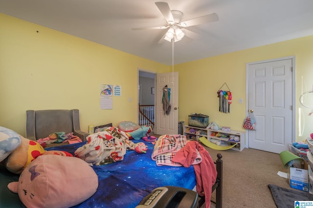 carpeted bedroom featuring ceiling fan