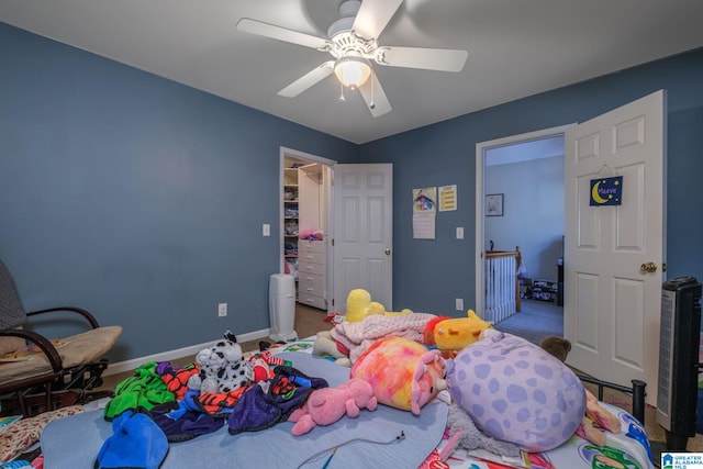 bedroom featuring carpet floors and ceiling fan