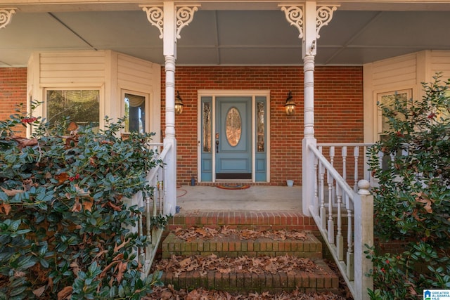 doorway to property with covered porch