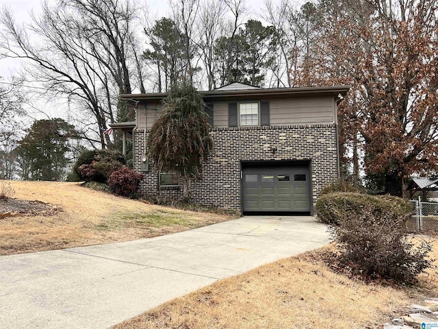 view of property with a garage and a front yard