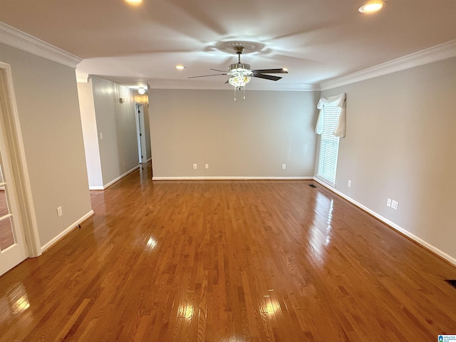 unfurnished room with hardwood / wood-style flooring, crown molding, and ceiling fan