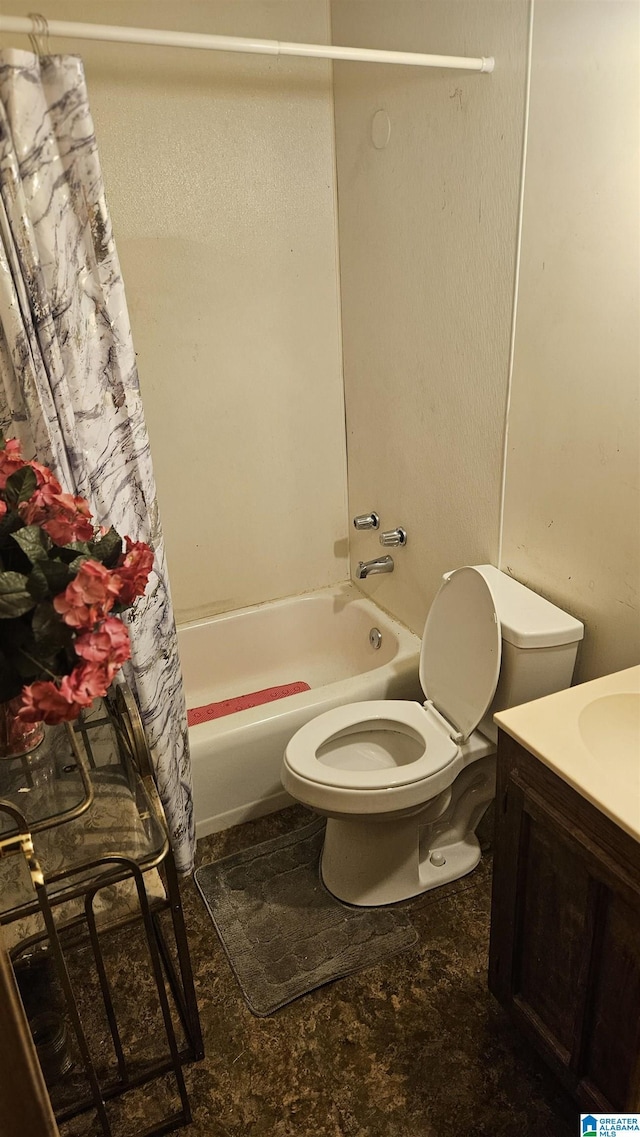 full bathroom featuring shower / bath combo, toilet, and vanity