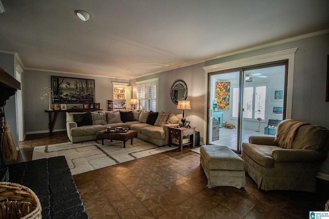 living room featuring french doors, a wealth of natural light, and crown molding