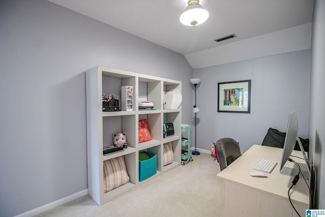 office space featuring vaulted ceiling and carpet floors