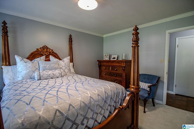 bedroom with crown molding and carpet flooring