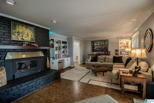 living room featuring a brick fireplace, dark parquet flooring, and ornamental molding