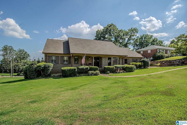 view of front of home with a front yard