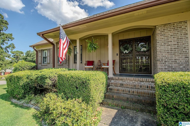 doorway to property with a porch