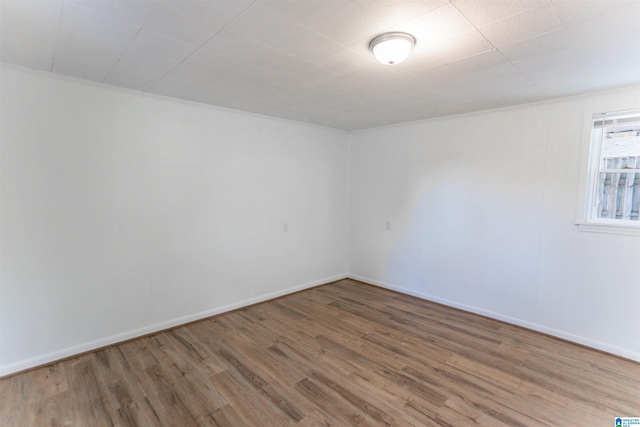 empty room featuring hardwood / wood-style flooring