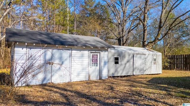 view of outdoor structure with a yard