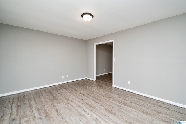 empty room featuring light hardwood / wood-style floors